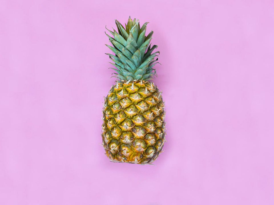 pineapple-purple-background-gettyimages-932252212-hero-57df3fb128b045418c13aa1ff5c548ca